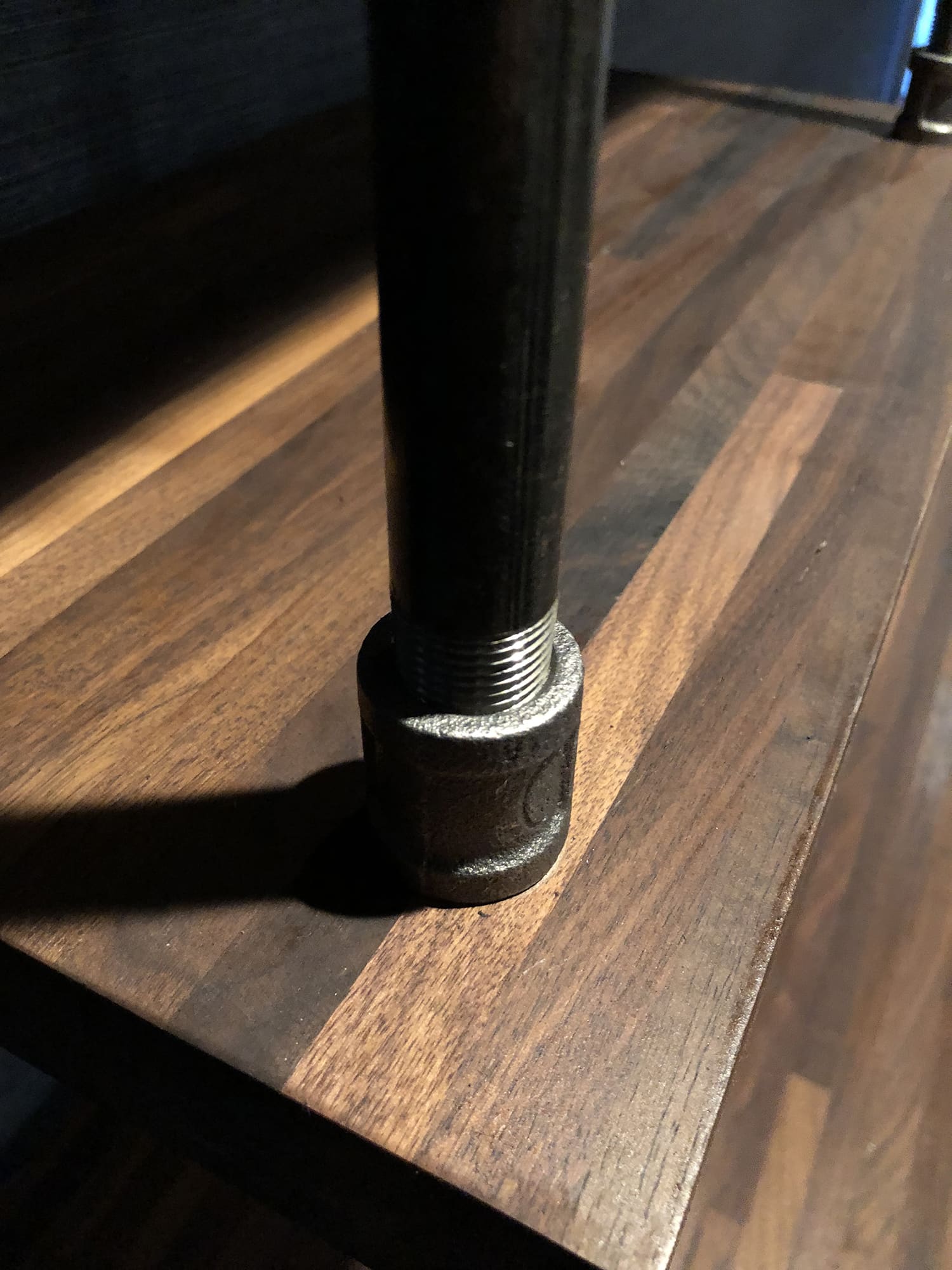 close up photo of black matte pipe and American walnut butcher block | Soil & Oak