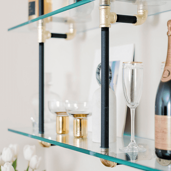 black and brass pipes and glass shelves | Soil & Oak 