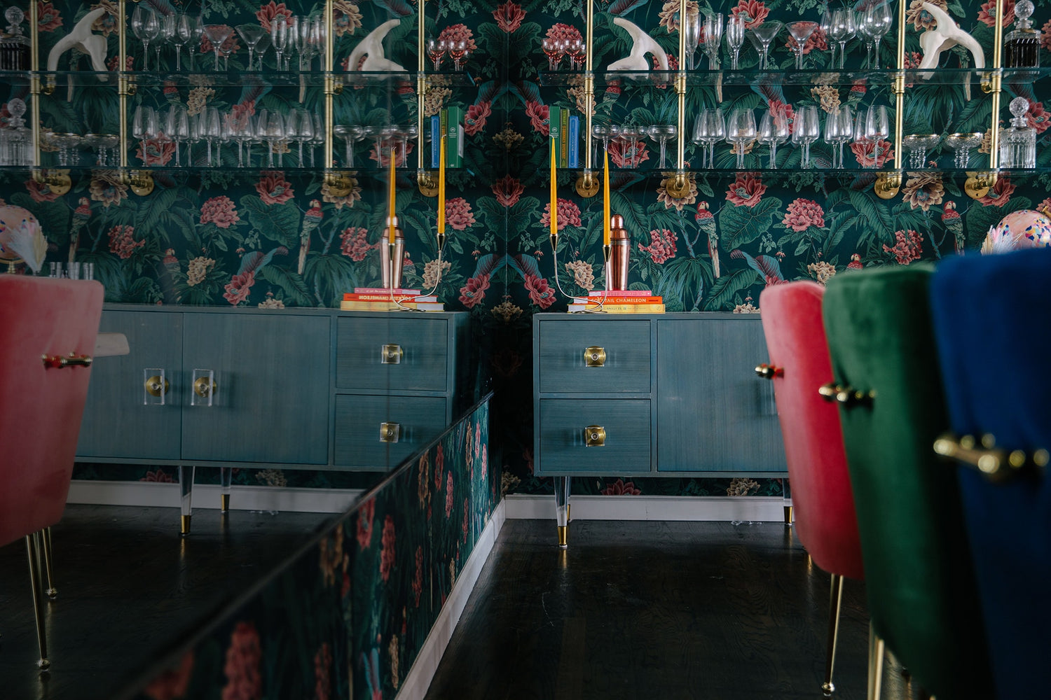 wall mounted shelves with brass plated pipes and glass shelves in a fun green and pink room designed by Rachel Martino and Megan Hoop Design | Soil & Oak