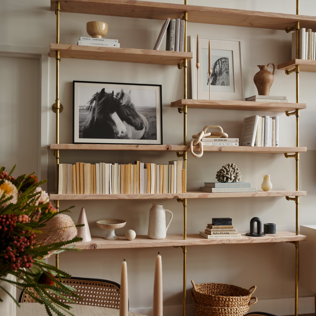 Custom bookshelves with brass plated pipes and maple shelves | Soil & Oak