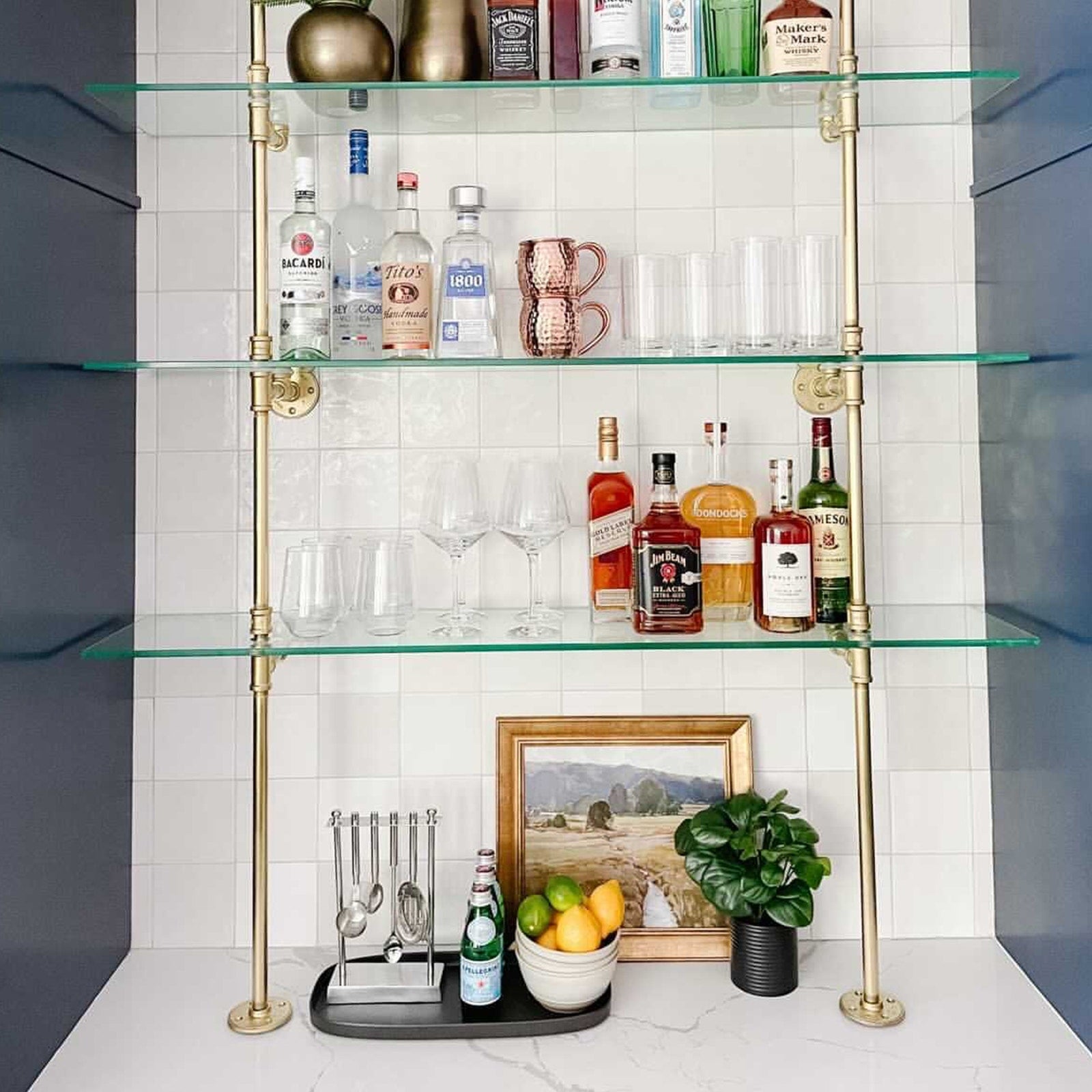 counter to ceiling shelving with brass plated pipes and glass shelves in kitchen | Soil & Oak