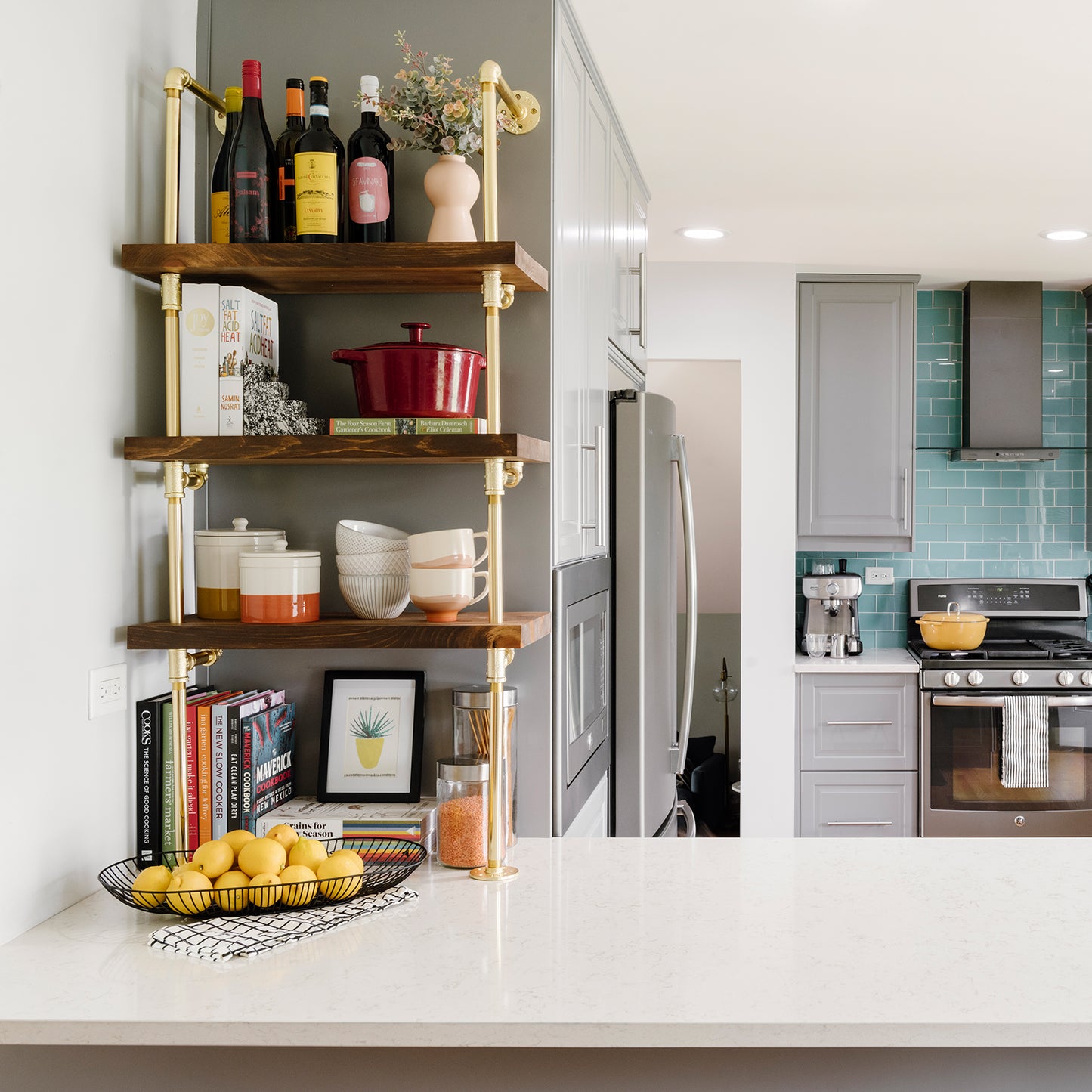 counter to wall unit with brass plated pipes and walnut shelves | Soil & Oak