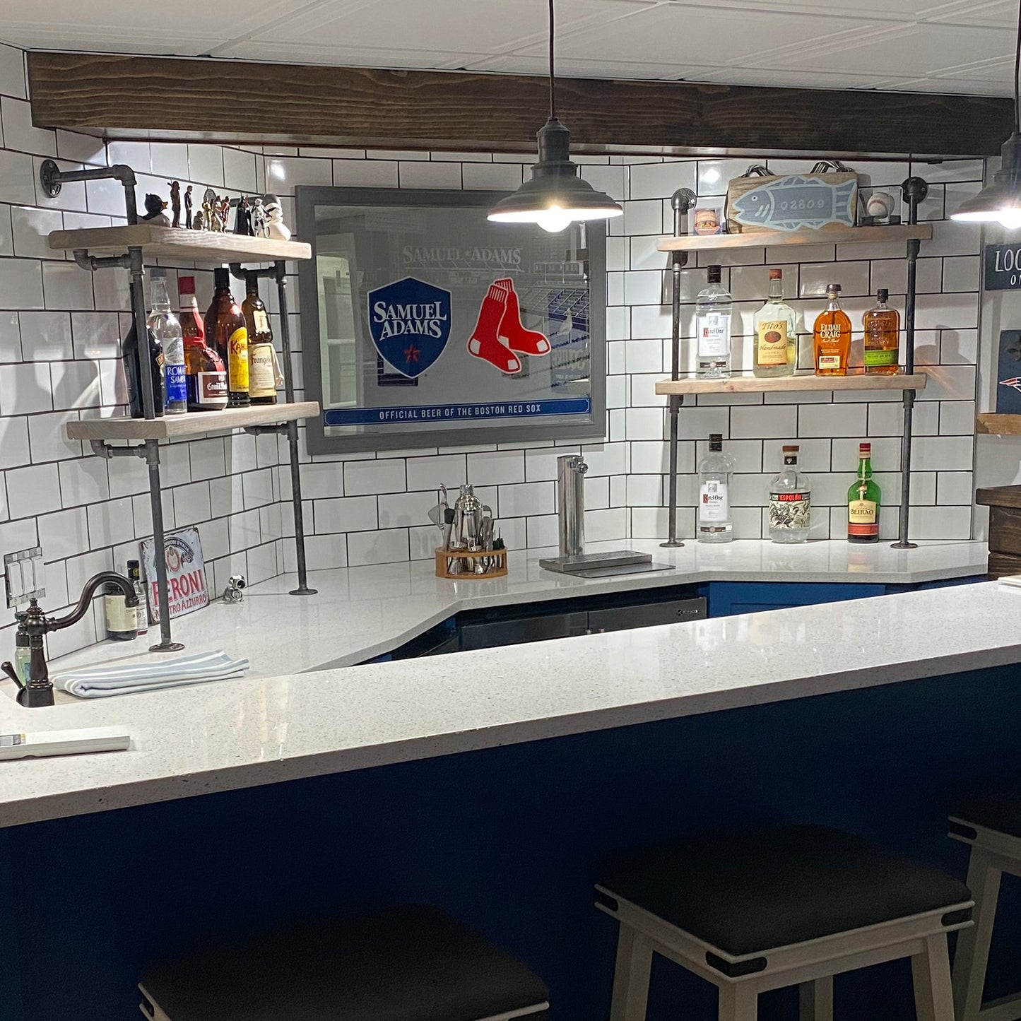 soil & oak counter to wall unit with black pipes and maple shelves