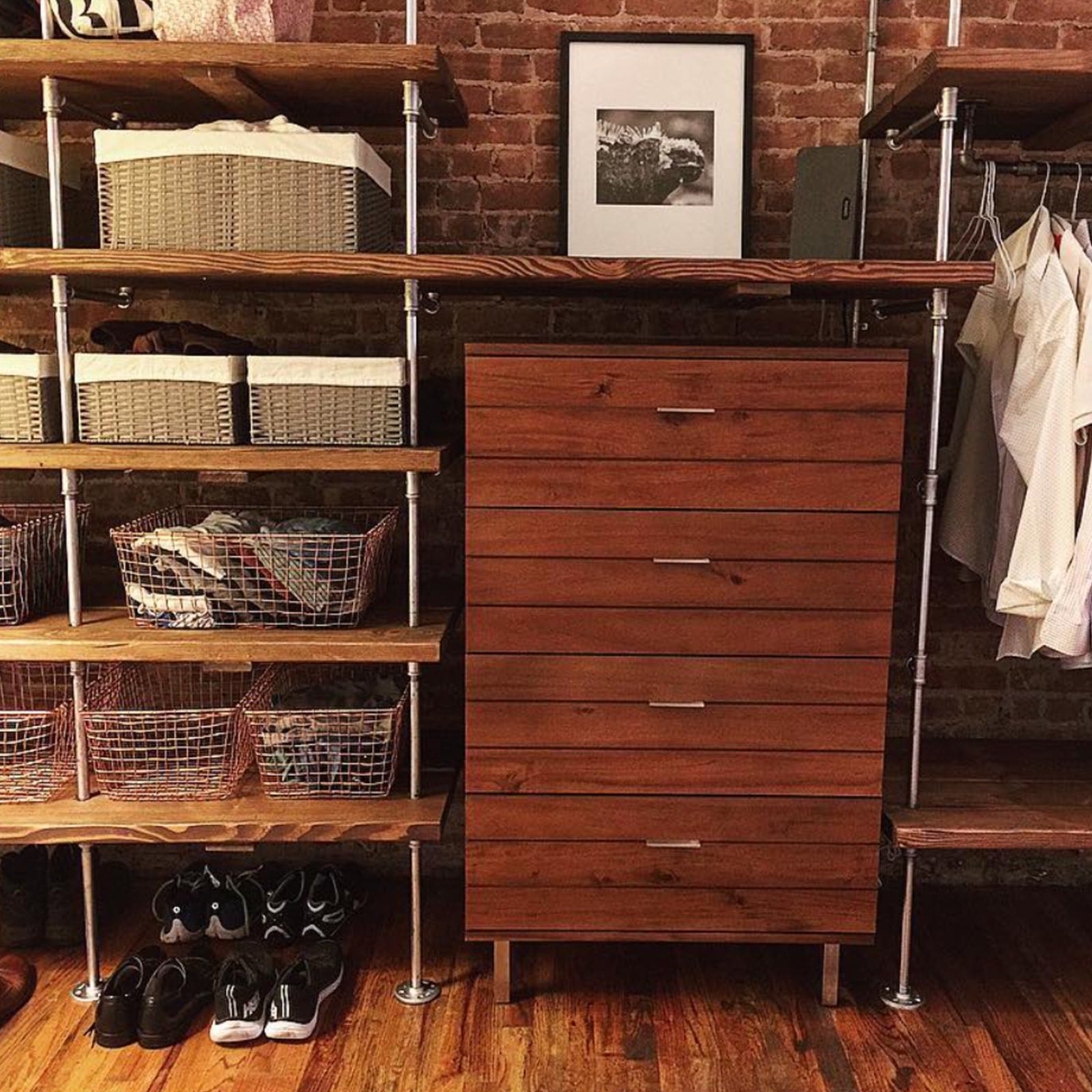 custom home closet organization chrome pipe and walnut shelves | Soil & Oak