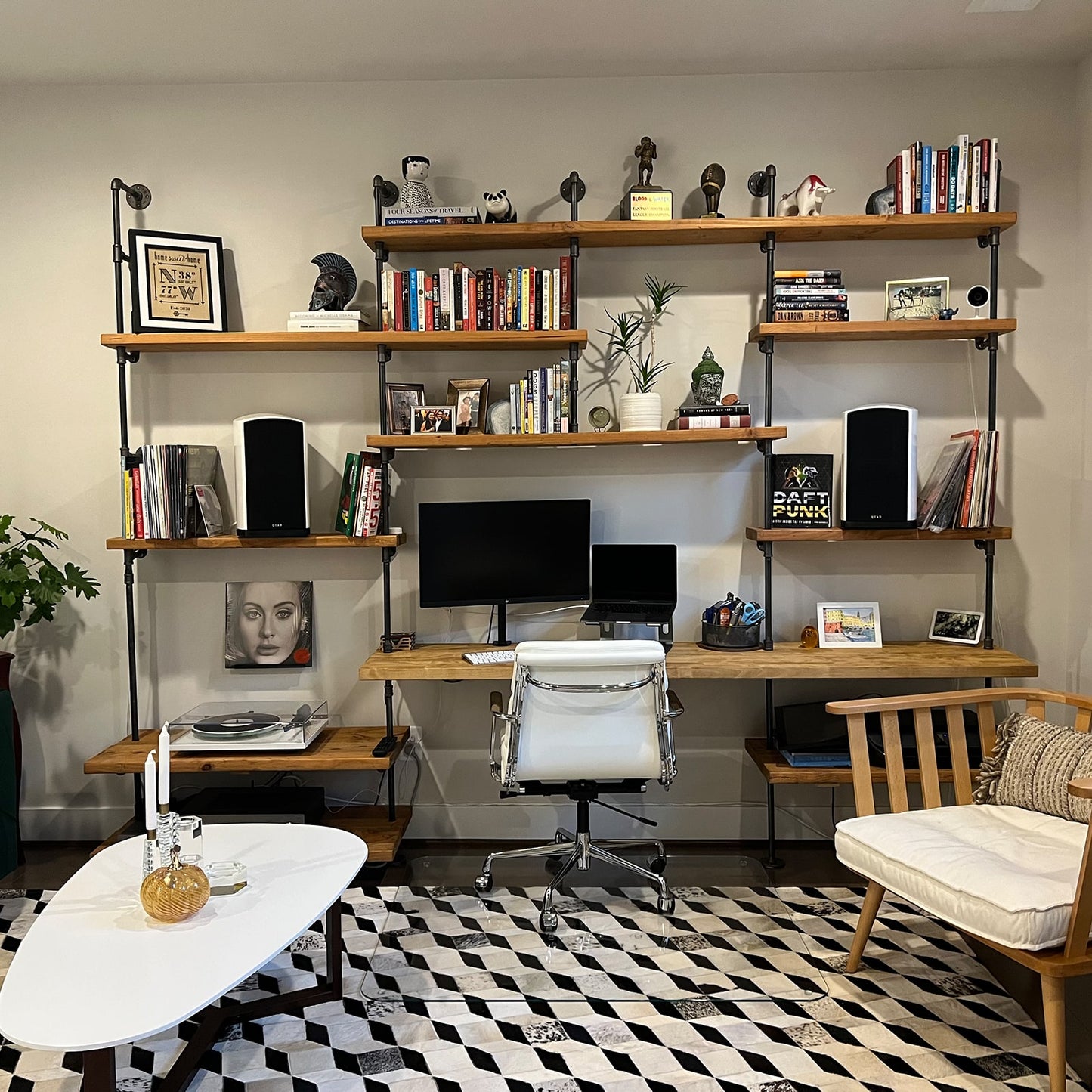 custom bookshelf and built-in desk with black pipes and oak shelves | Soil & Oak