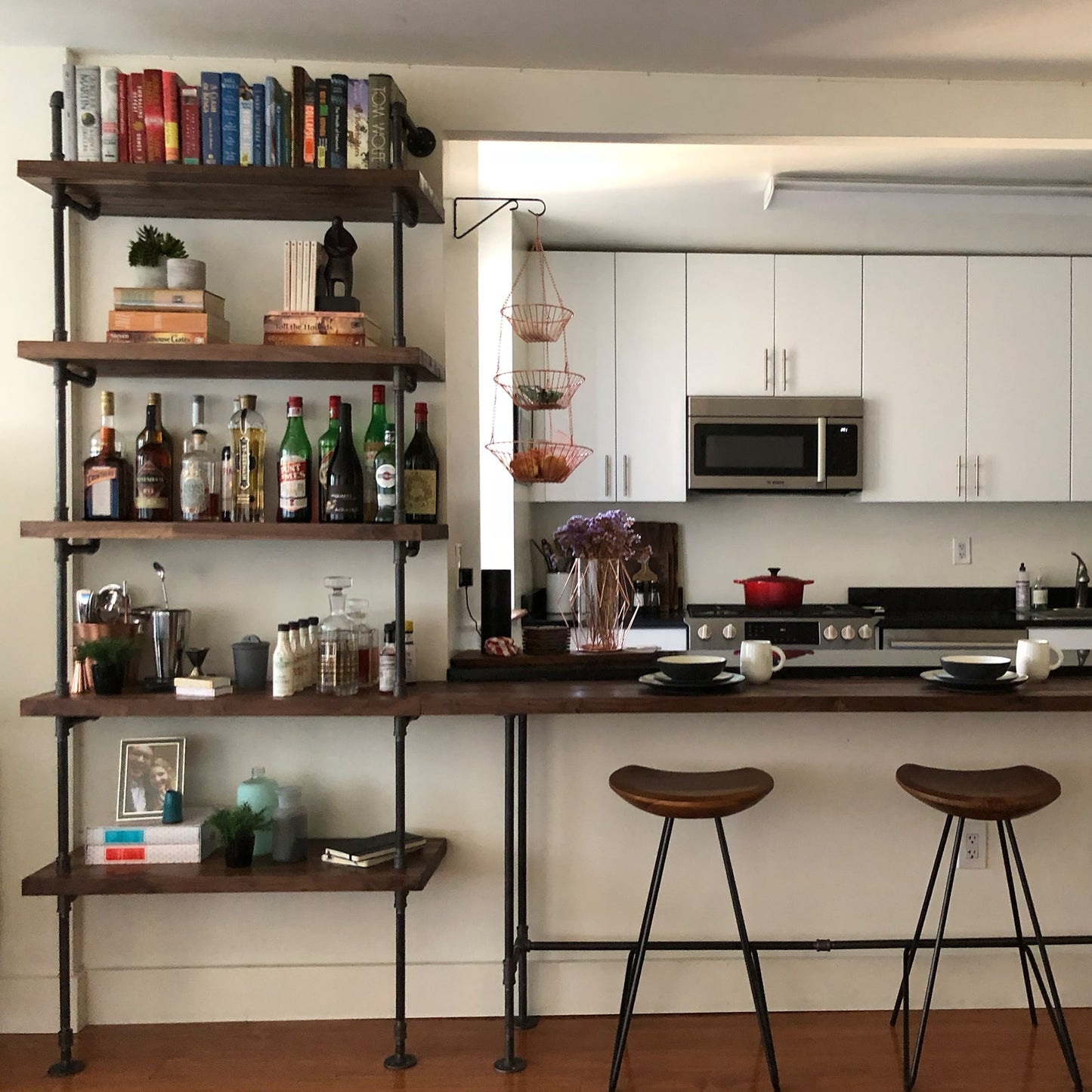 kitchen and bar dark stained wood shelves | Soil & Oak