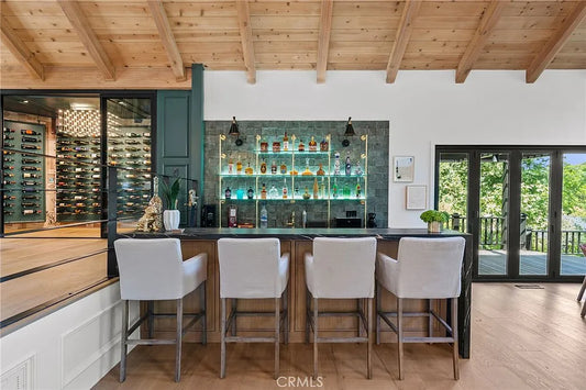 Light Your Shelves Right: Top Lighting Solutions for Custom Built-In and Bar Shelving