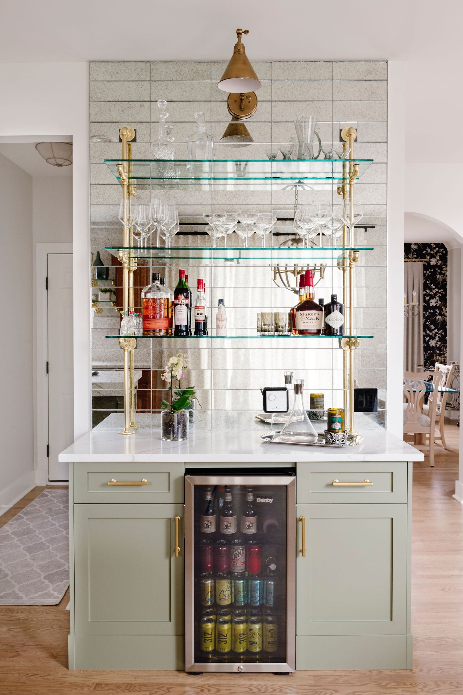counter to wall unit with brass plated pipes and glass shelves kitchen and bar