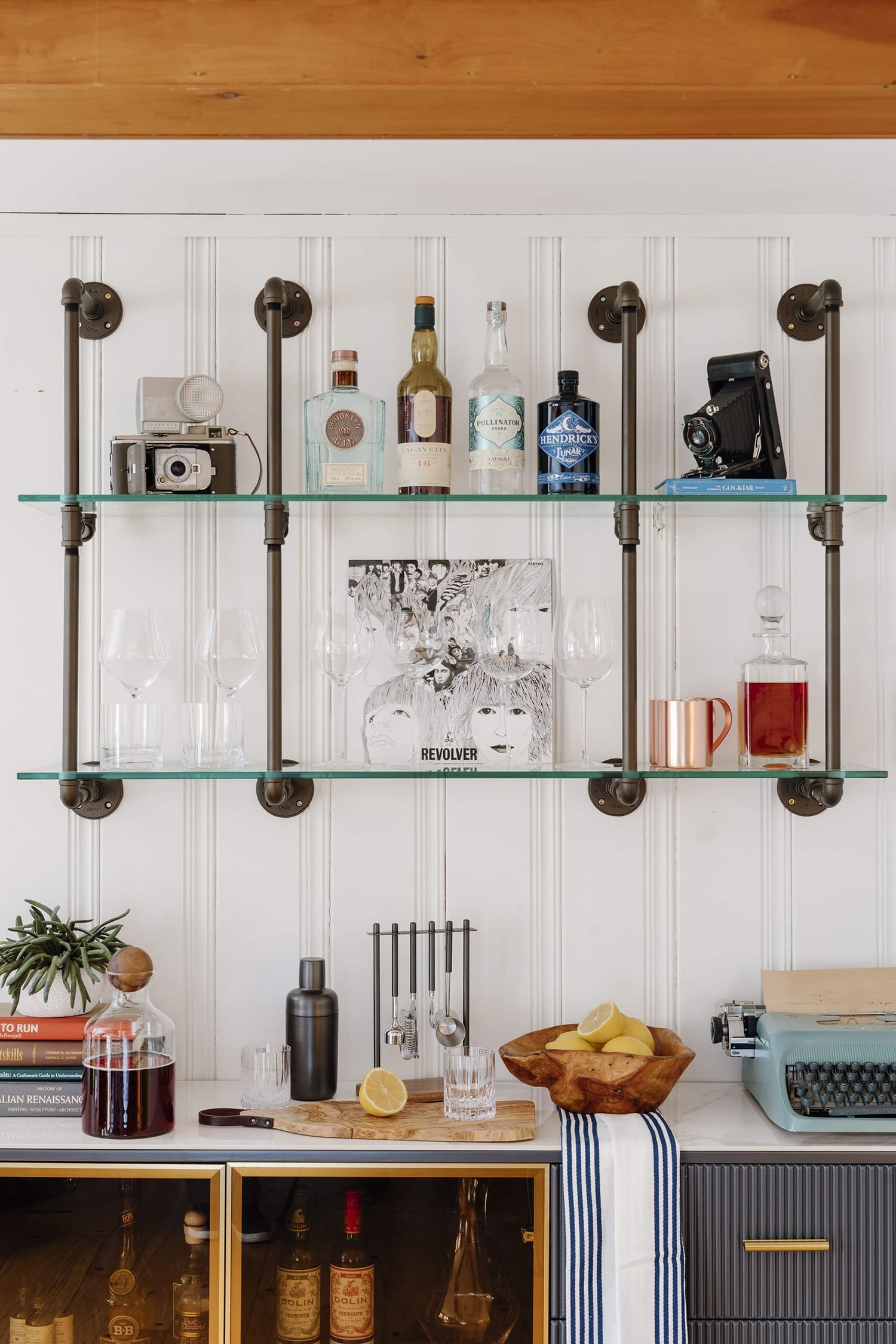 Wall mounted with black raw steel pipes and glass shelves | Soil & Oak