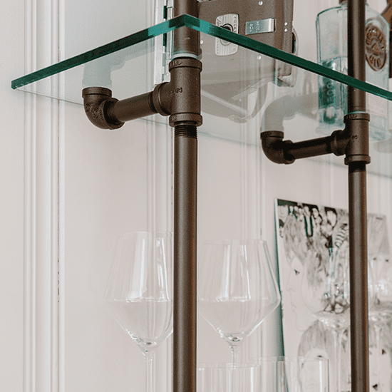 close up photo of oil rubbed bronze powder coated pipes | Soil & Oak