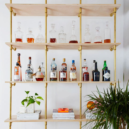 Raw sanded plywood shelves with brass plated pipes | Soil & Oak