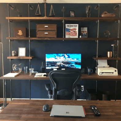 Built in desk with wall mounted oak shelves with black pipes | Soil & Oak