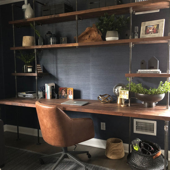 American walnut butcher block shelves on a built-in desk with black pipes | Soil & Oak