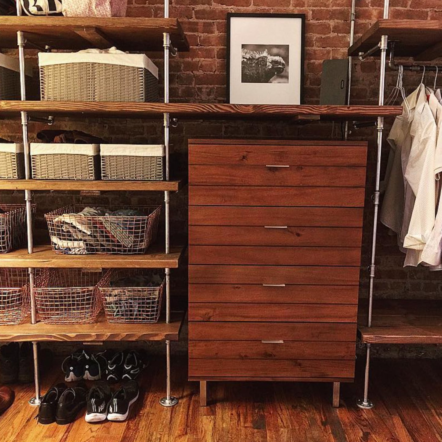 soil & oak custom home closet organization chrome pipe and walnut shelves