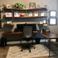custom soil & oak built-in desk with black pipes and dark stained walnut shelves and table top
