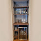 Custom home bar unit with black pipes and walnut butcher block shelves | Soil & Oak